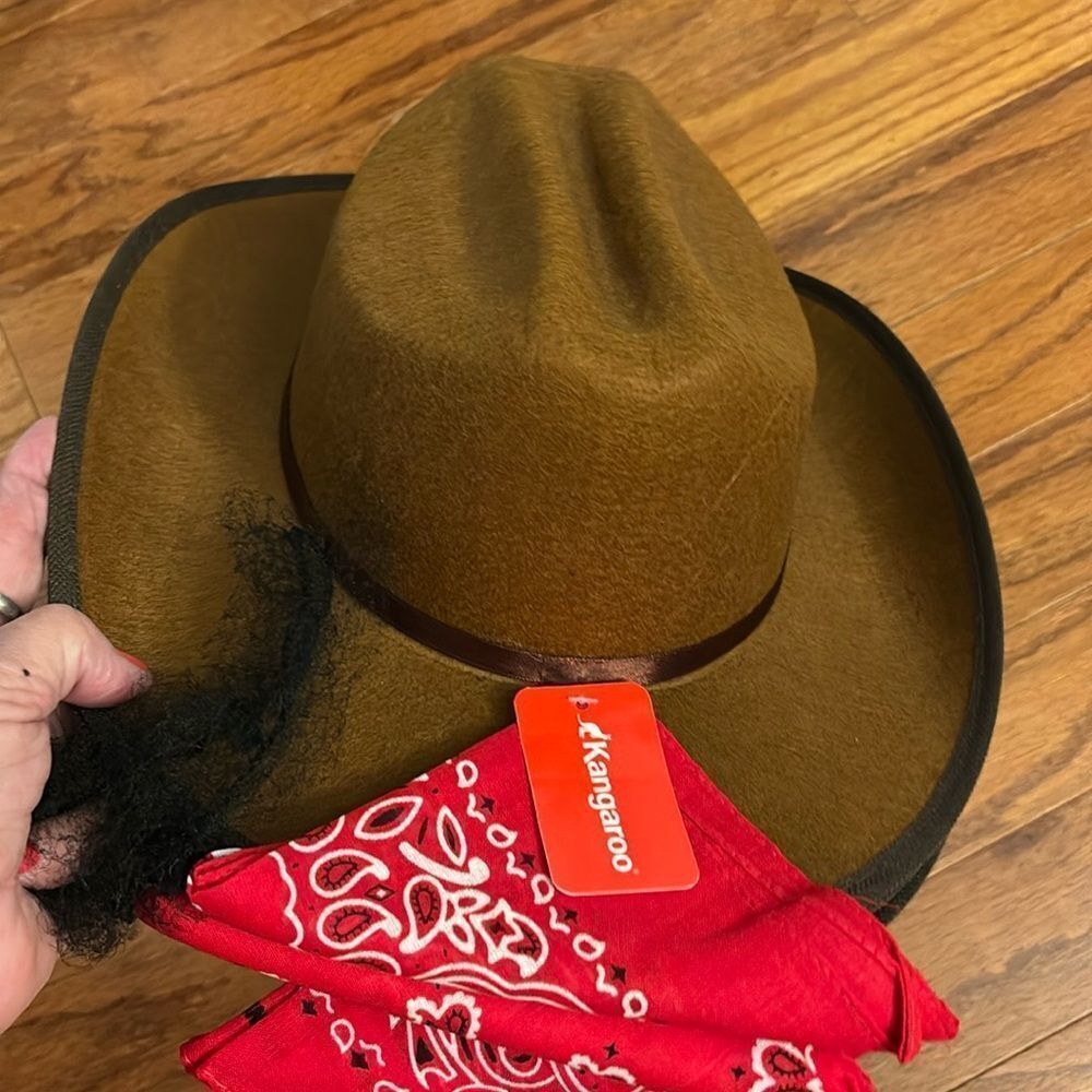 One cowboy hat/bandana for dress up. Unisex